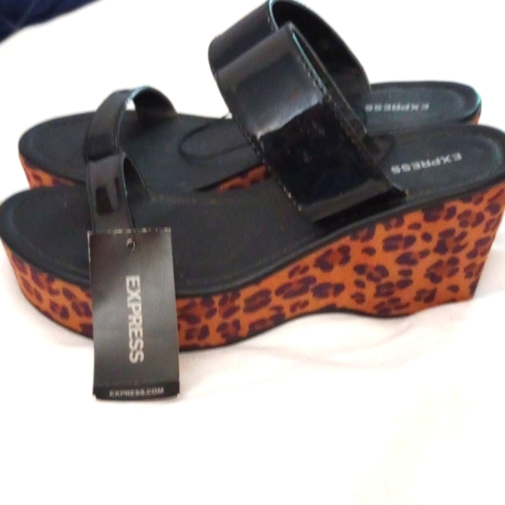Express Black and Brown Wedge Sandals with Stylish Elevation
